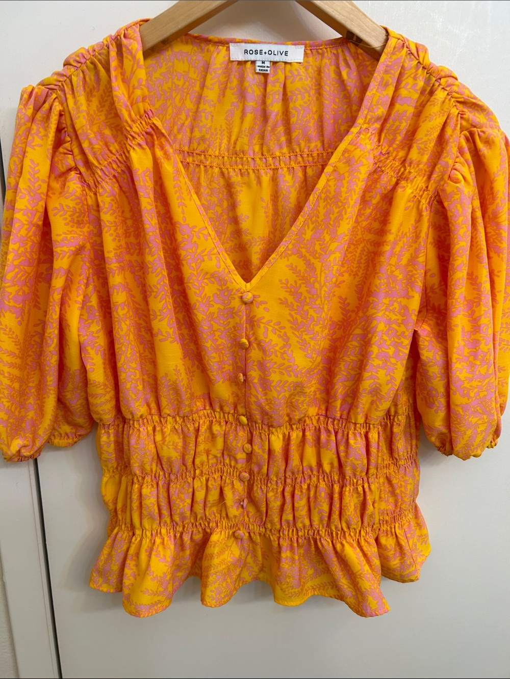 Rose & Olive Yellow and Pink Smocked Peplum V-Neck Blouse